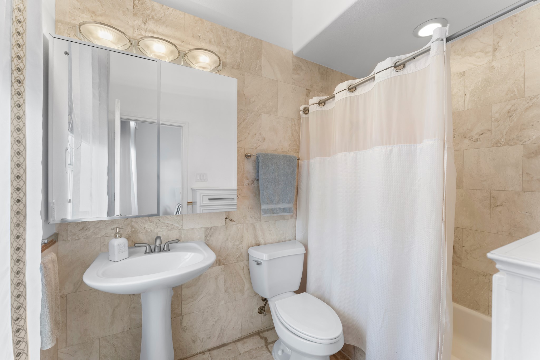 315 Fairview Street, Unit A Houston, TX 77006 - Photo 30 of 35 a bathroom with a sink a toilet and shower