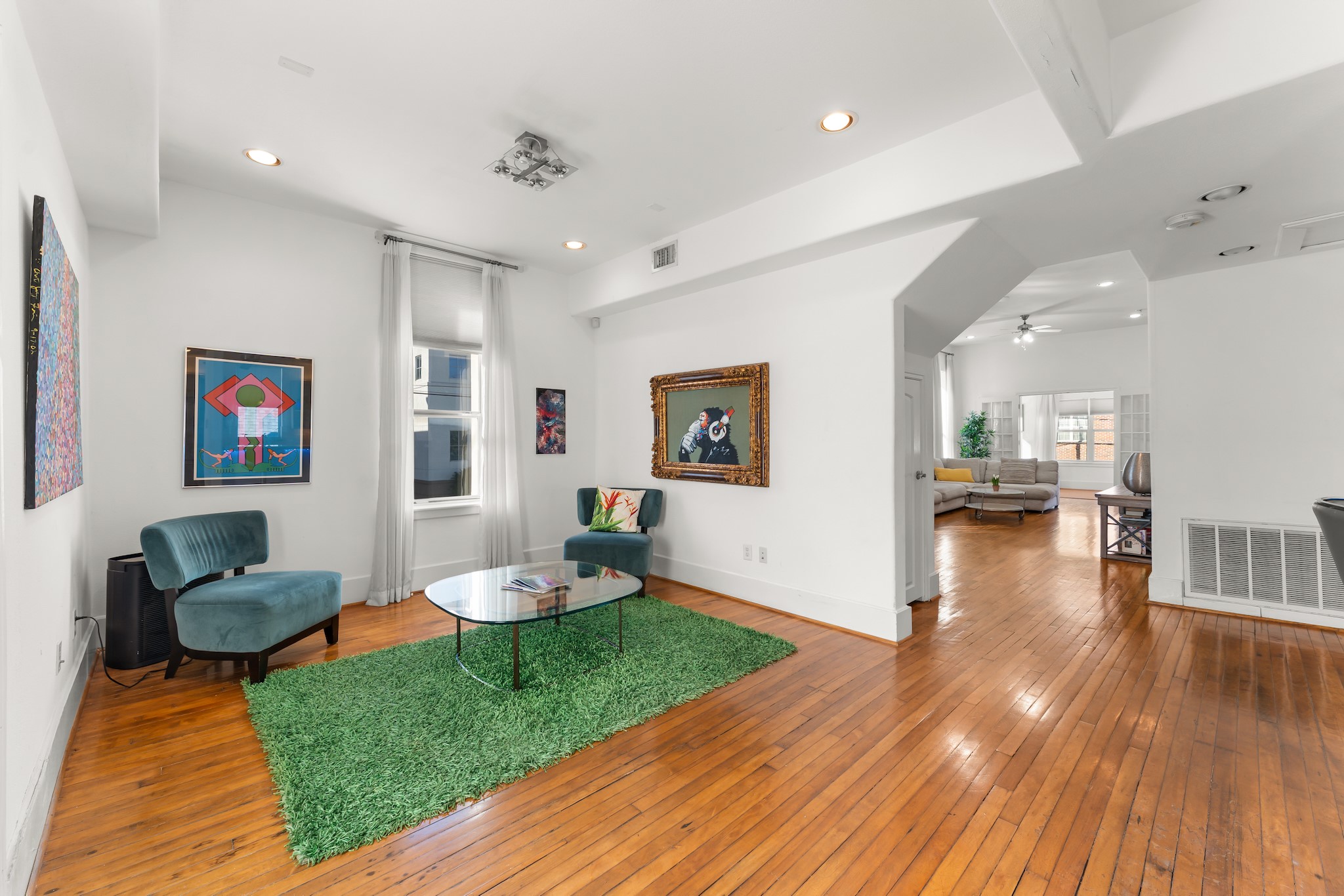 315 Fairview Street, Unit A Houston, TX 77006 - Photo 5 of 35 a living room with furniture and a wooden floor