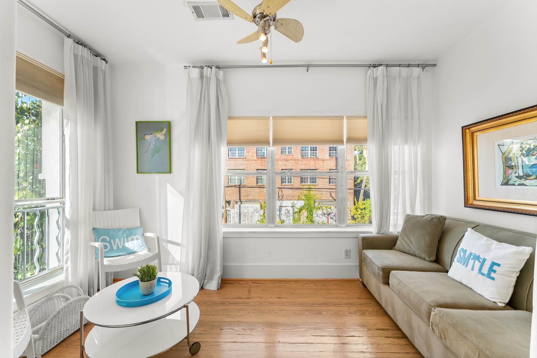 315 Fairview Street, Unit A Houston, TX 77006 - Photo 10 of 35 a living room with furniture and a table