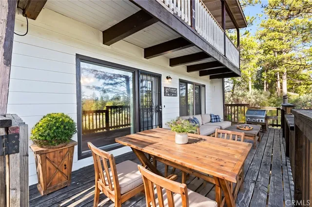 a view of front door deck and patio