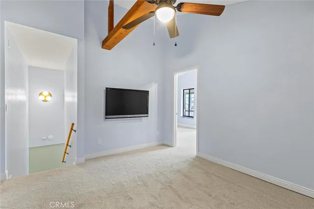 a view of a room with a large window