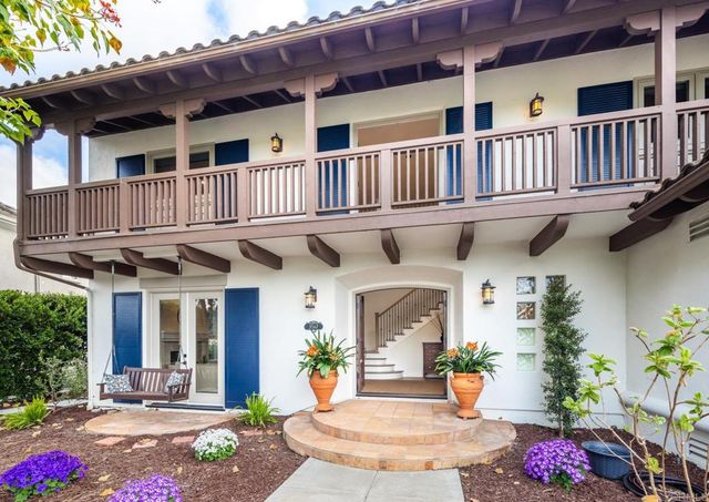 a front view of a house with a porch