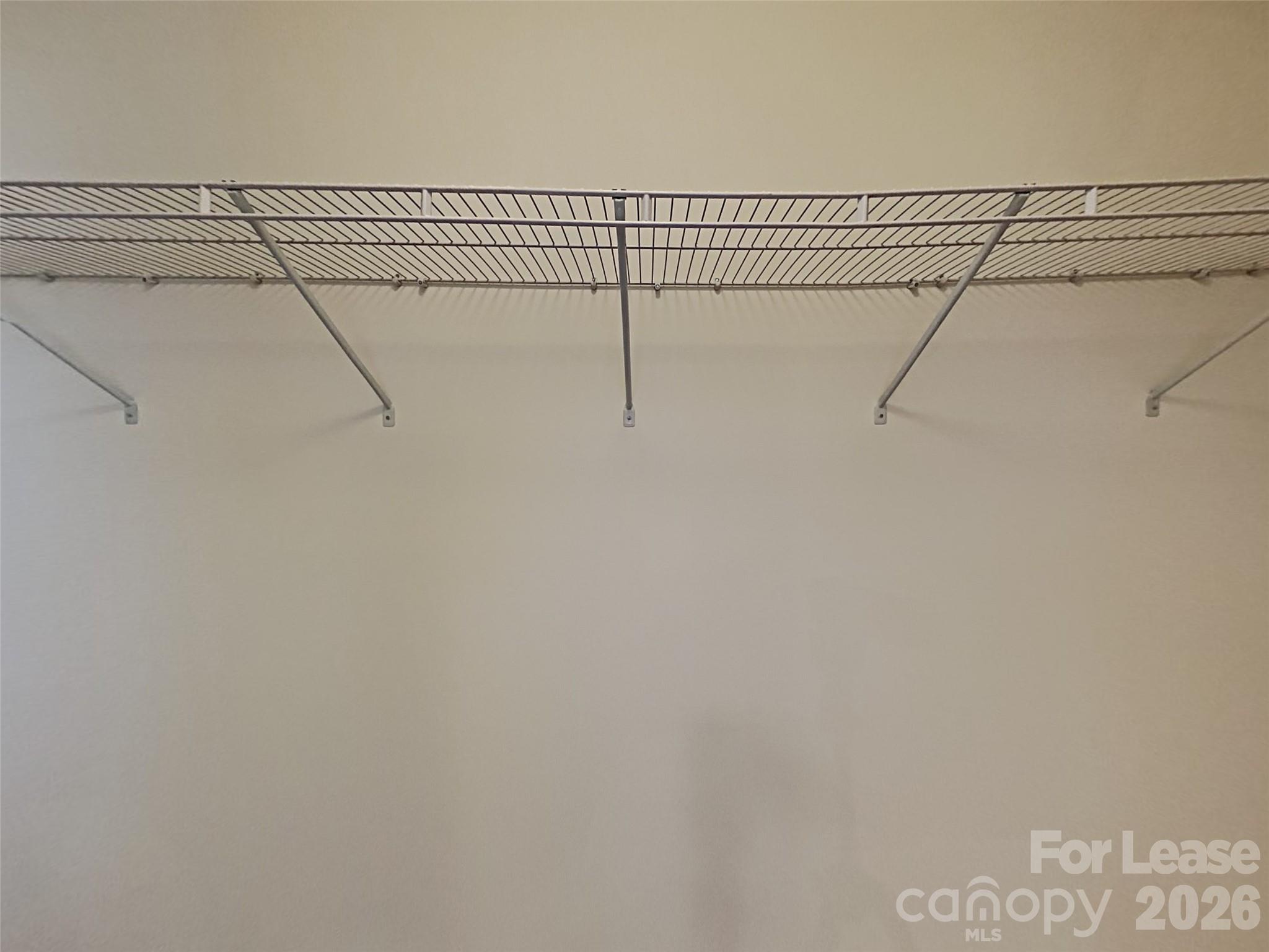 543 Contentment Drive Locust, NC 28097 - Photo 16 of 36 a view of a room with racks on the wall