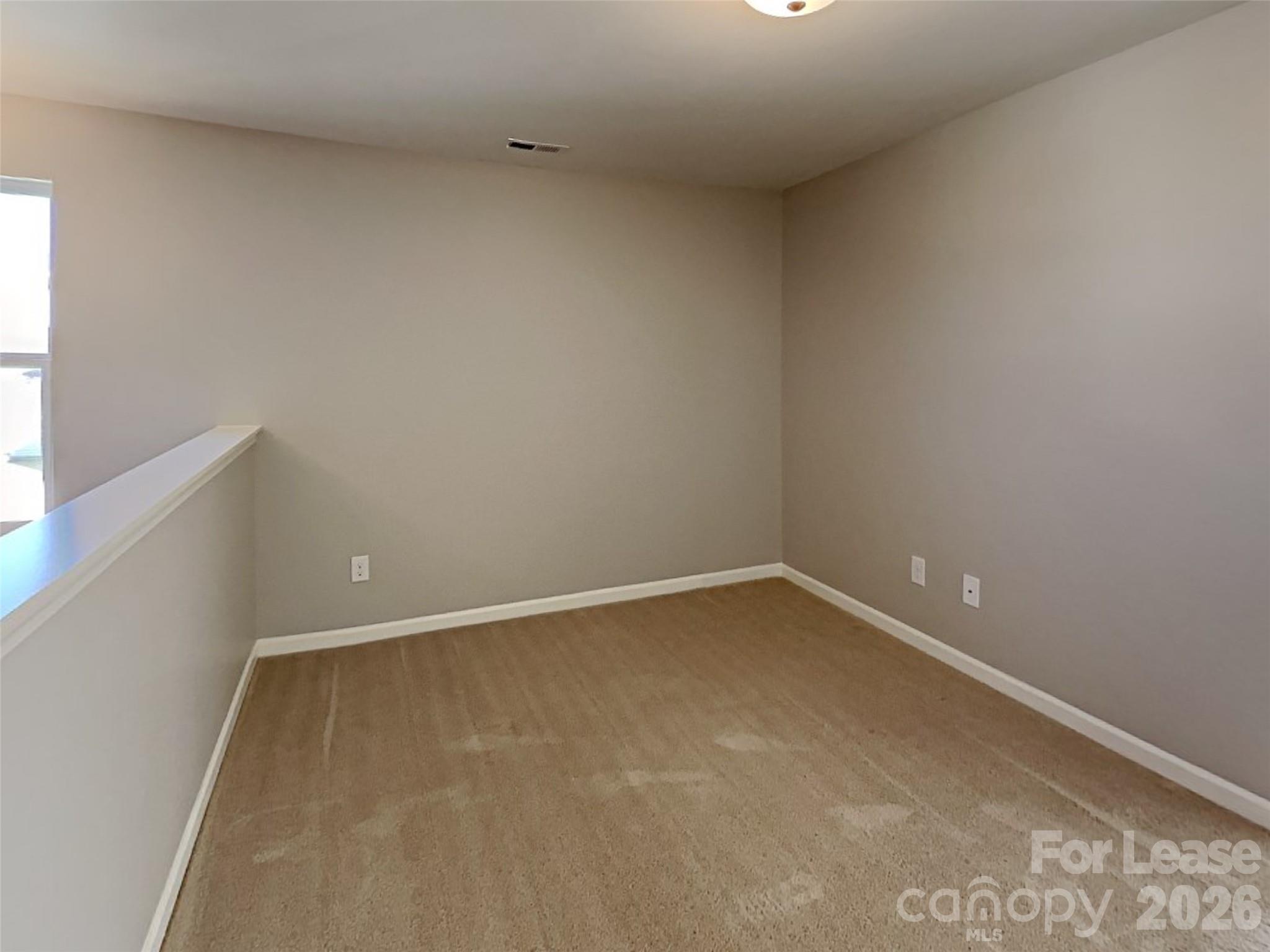 543 Contentment Drive Locust, NC 28097 - Photo 26 of 36 a view of an empty room