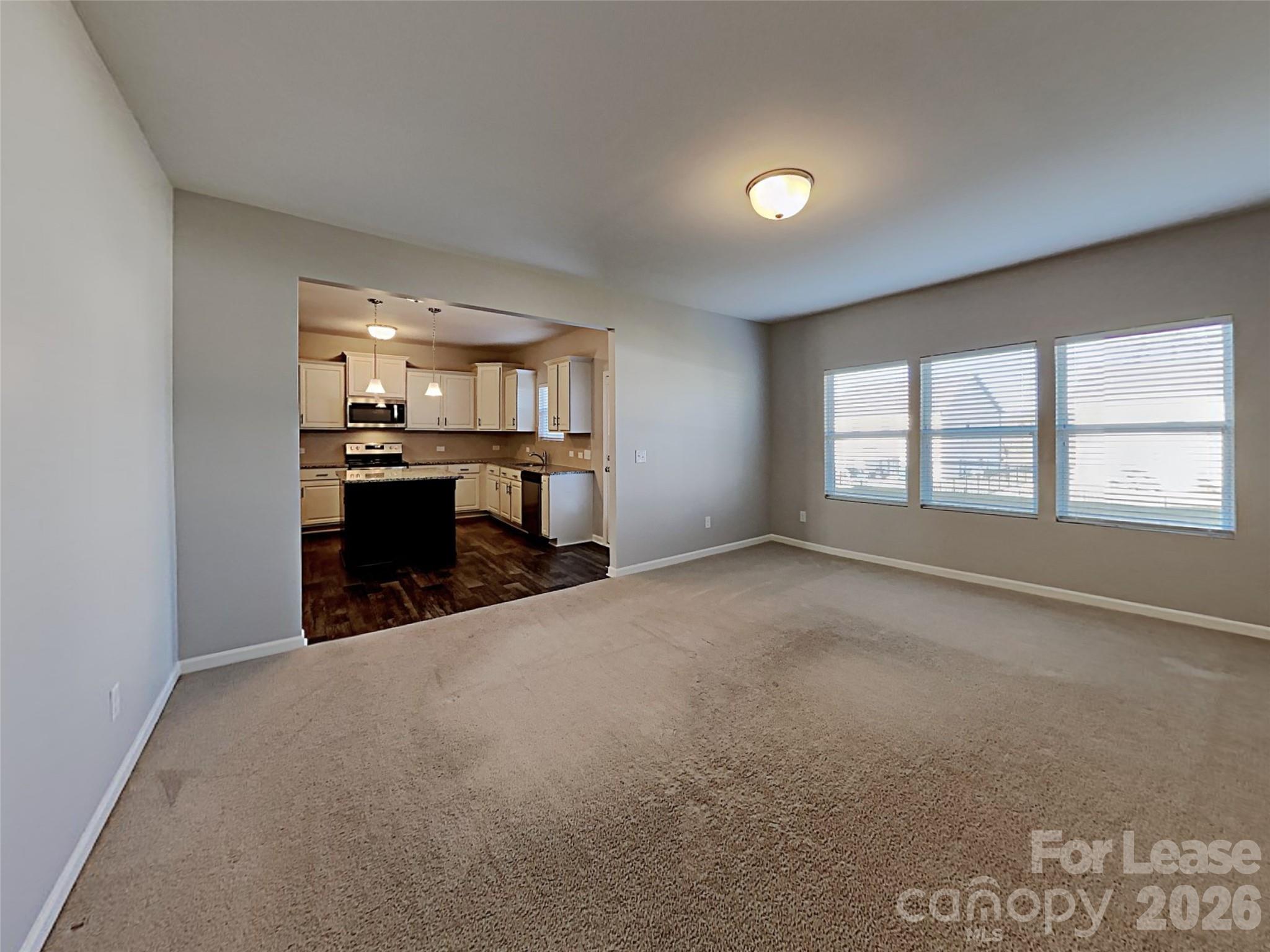 543 Contentment Drive Locust, NC 28097 - Photo 30 of 36 a view of an empty room with a window