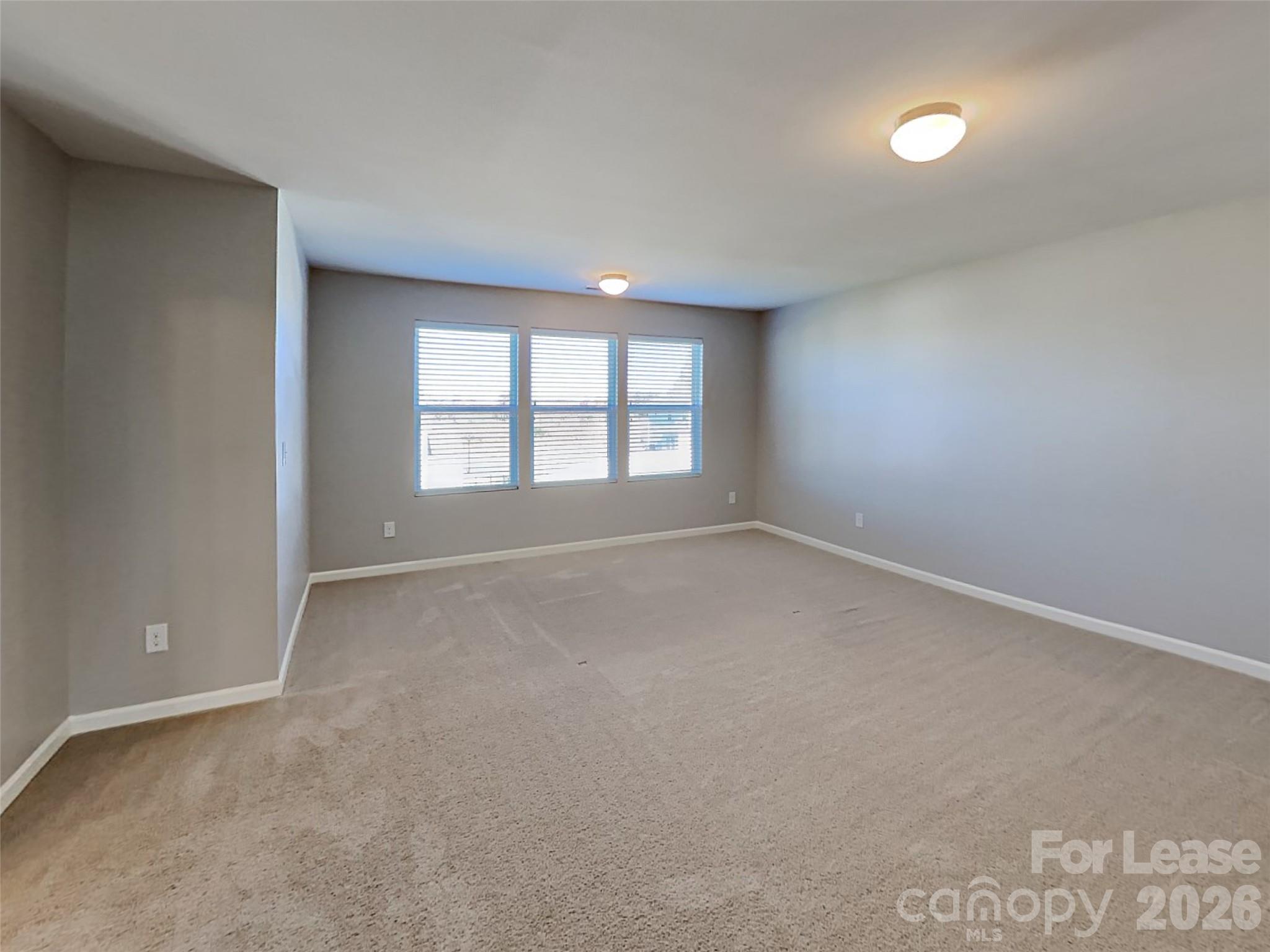 543 Contentment Drive Locust, NC 28097 - Photo 3 of 36 a view of empty room with window