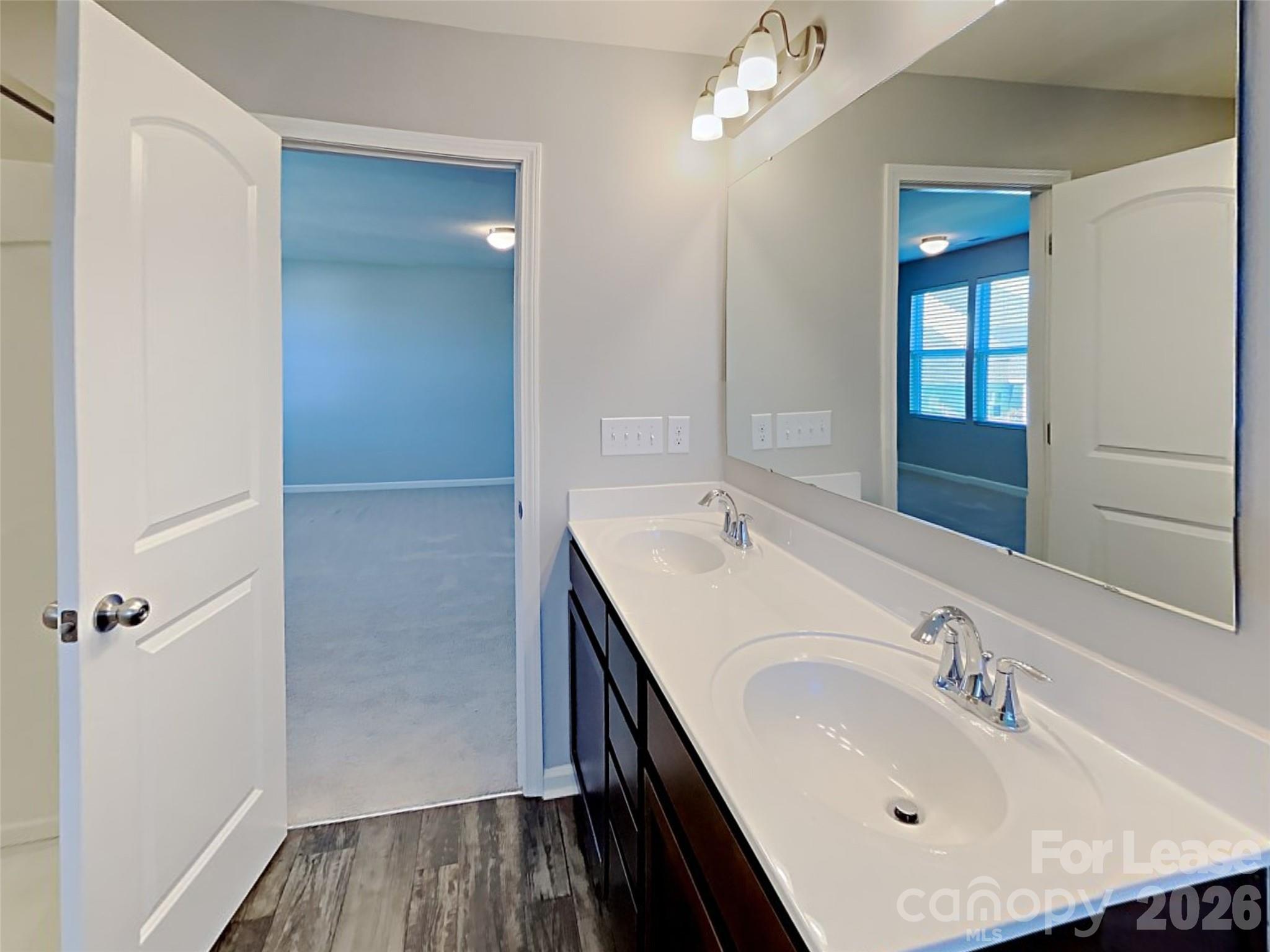 543 Contentment Drive Locust, NC 28097 - Photo 6 of 36 a bathroom with a sink and a mirror