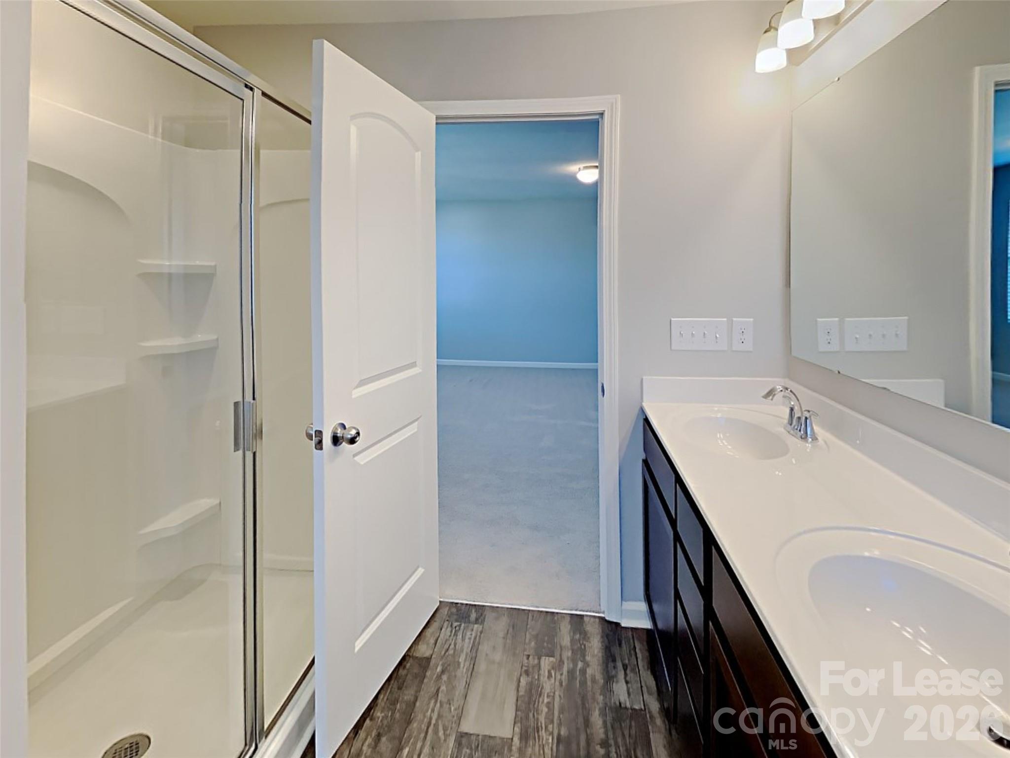 543 Contentment Drive Locust, NC 28097 - Photo 7 of 36 a bathroom with a sink a toilet and shower