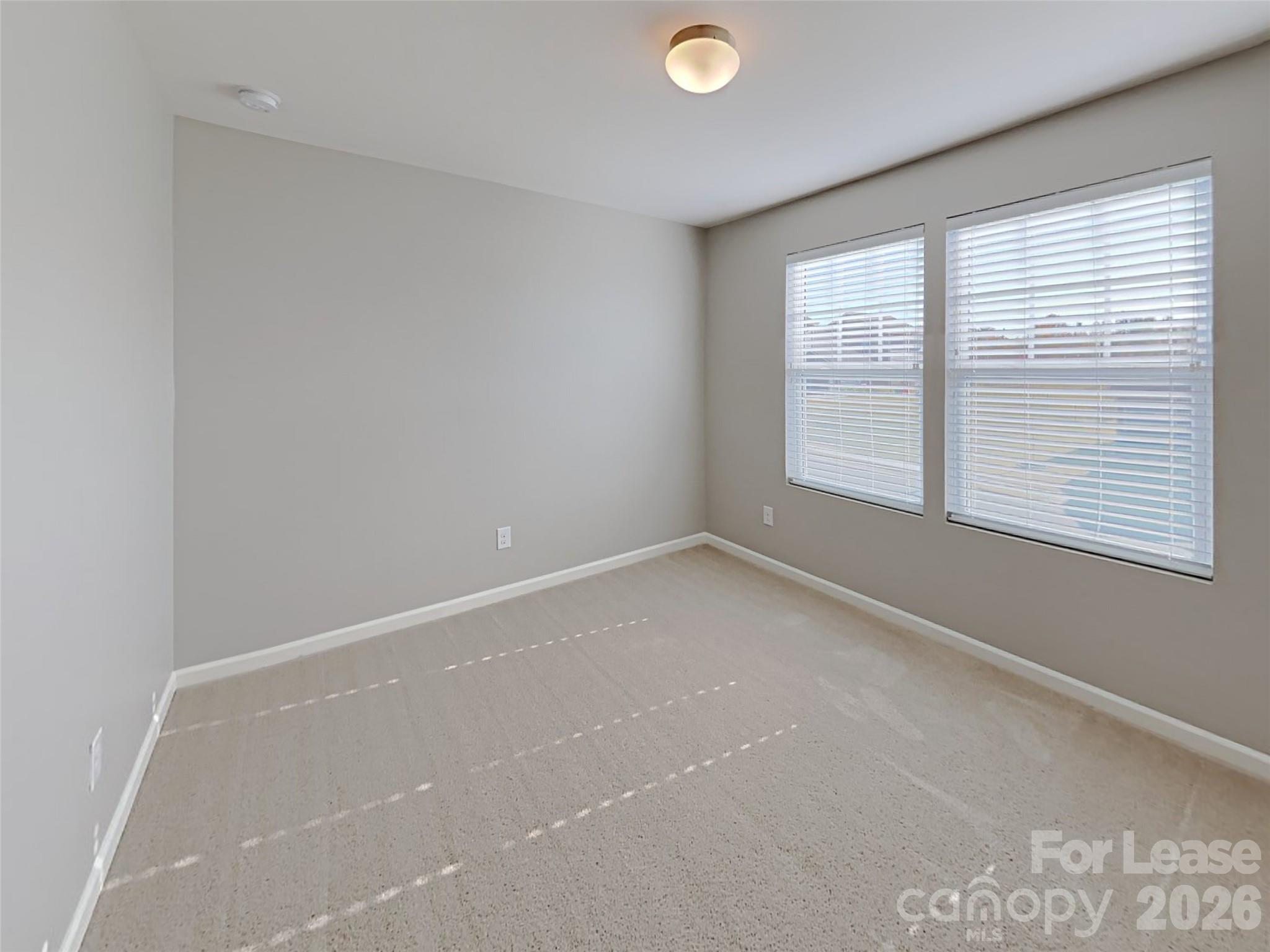 543 Contentment Drive Locust, NC 28097 - Photo 10 of 36 an empty room with a window