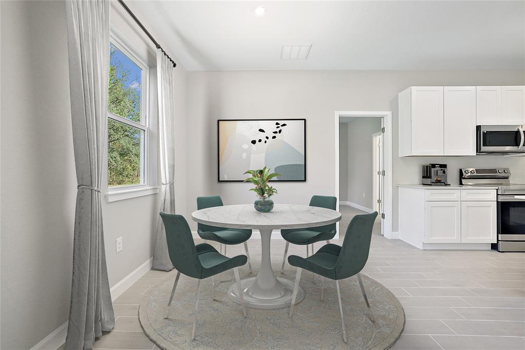 7348 Southwest 134th Street Ocala, FL 34473 - Photo 23 of 49 a view of a dining room with furniture window and outside view