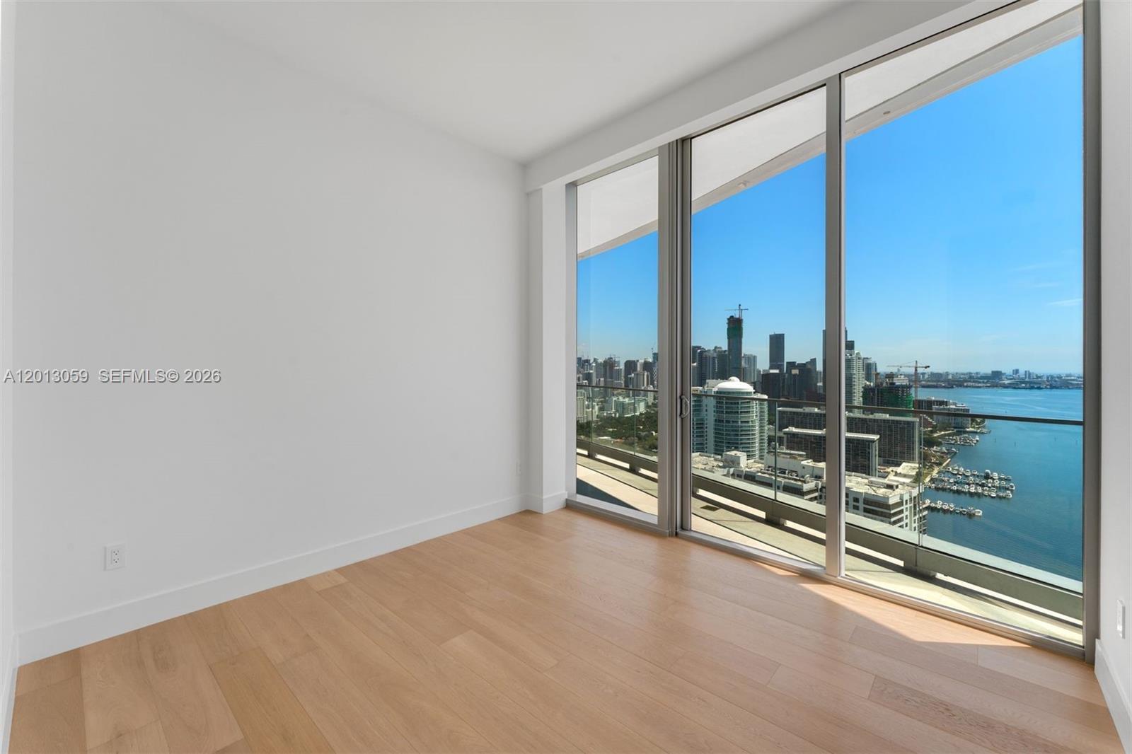175 Southeast 25th Road, Unit 3601 Miami, FL 33129 - Photo 18 of 27 a view of a room with floor to ceiling window and stairs