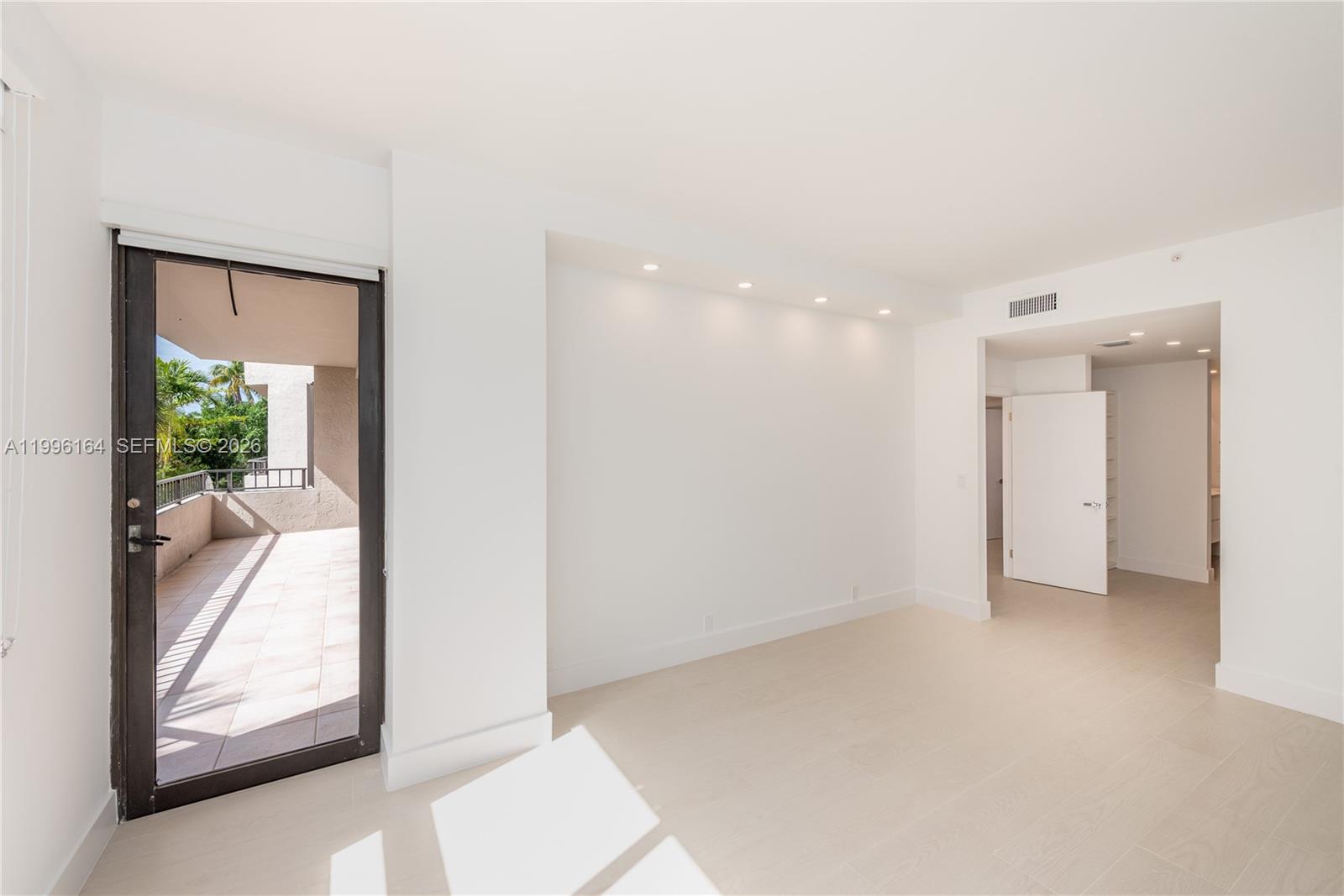 151 Crandon Boulevard, Unit 241 Key Biscayne, FL 33149 - Photo 12 of 28 a view of a room with large window