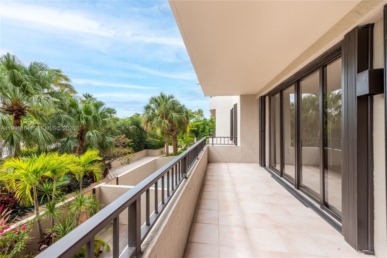 151 Crandon Boulevard, Unit 241 Key Biscayne, FL 33149 - Photo 26 of 28 a view of a balcony with wooden floor