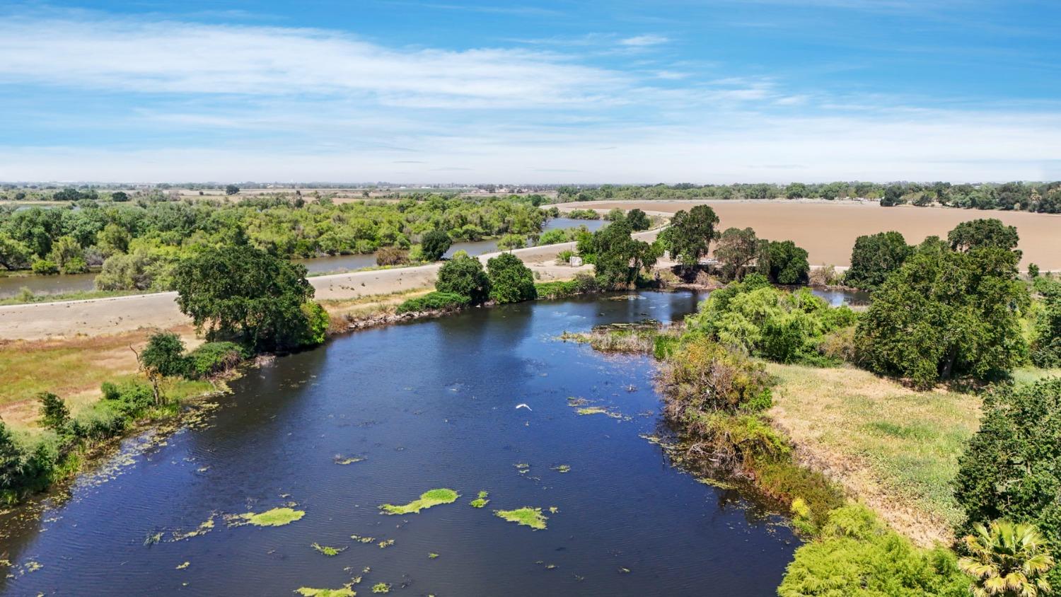 1390 Williamson Road Manteca, CA 95337 - Photo 11 of 27 a view of a lake with houses