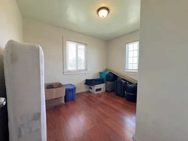 a living room with furniture and a windows