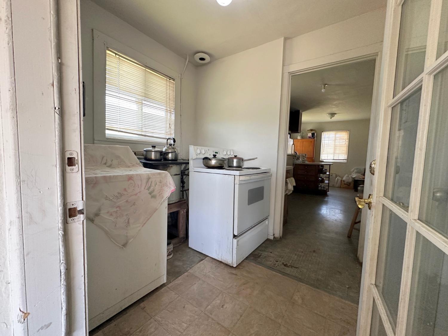 1390 Williamson Road Manteca, CA 95337 - Photo 22 of 27 a view of a kitchen with a sink