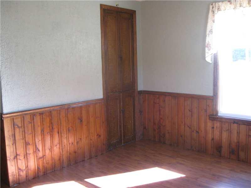 333 Eyth Road Butler, PA 16002 - Photo 10 of 15 Dining Room. Dining room w/ wainscoating, built-in cupboard, and door going to side porch.