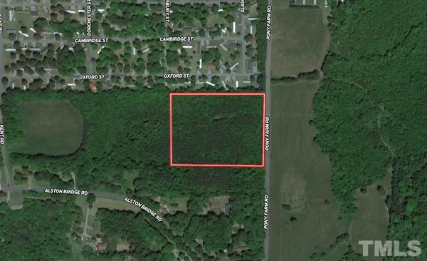 an aerial view of a house having yard