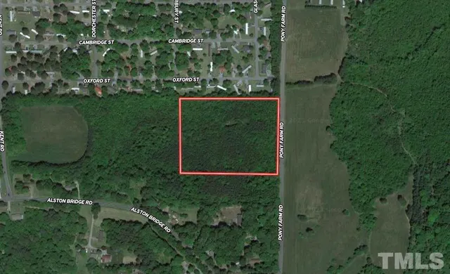 an aerial view of a house having yard