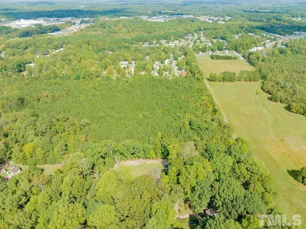 a view of a large body of water and green space