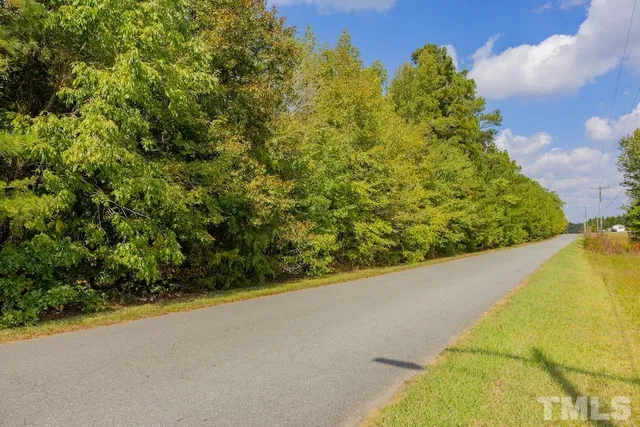 a view of swimming pool with an outdoor space and seating area