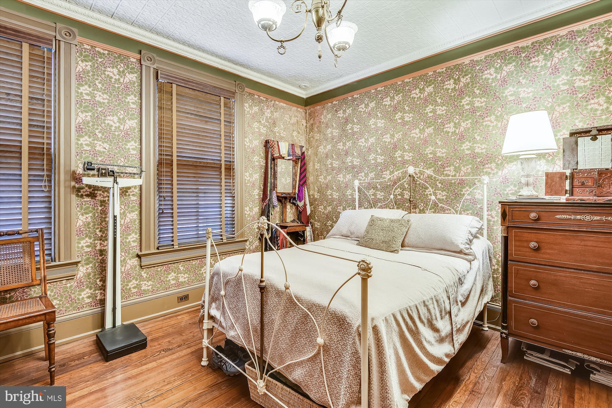 511 Seward Square Southeast Washington, DC 20003 - Photo 19 of 47 a bedroom with a bed and wooden floor