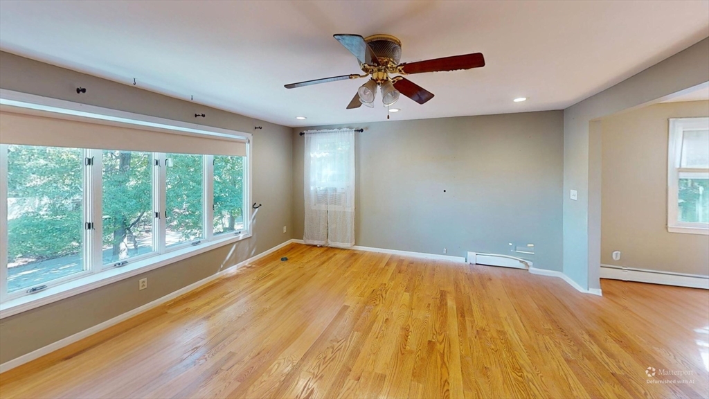 18 Cranston Circle Woburn, MA 01801 - Photo 1 of 19 a view of room with a ceiling fan and window
