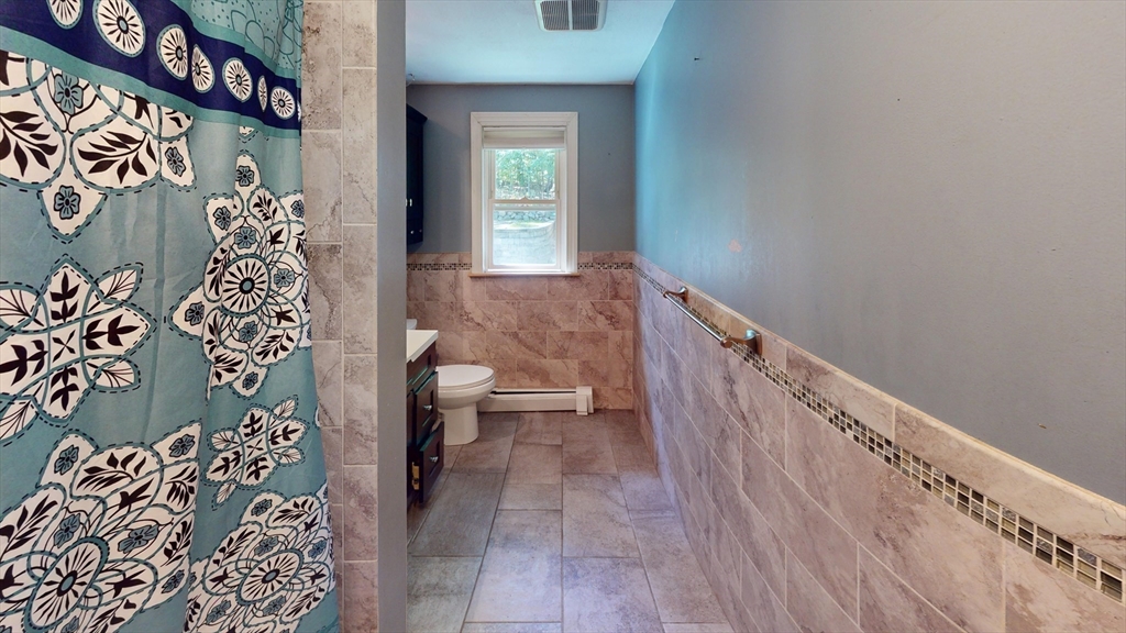 18 Cranston Circle Woburn, MA 01801 - Photo 5 of 19 a view of a hallway with entryway