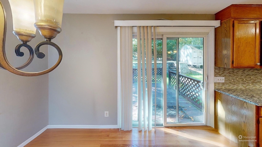 18 Cranston Circle Woburn, MA 01801 - Photo 8 of 19 a view of entryway with wooden floor