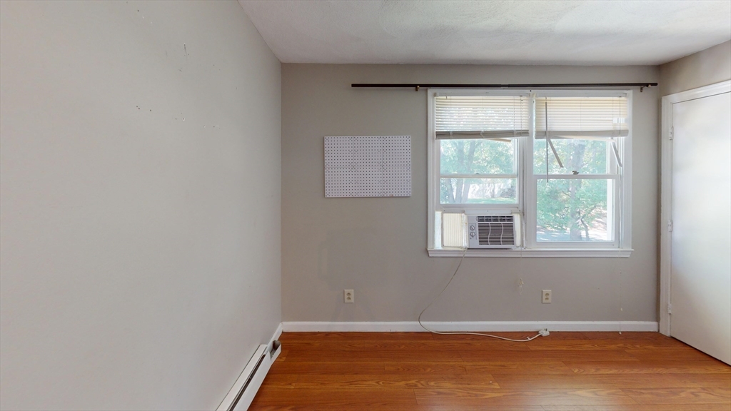 18 Cranston Circle Woburn, MA 01801 - Photo 10 of 19 an empty room with a window