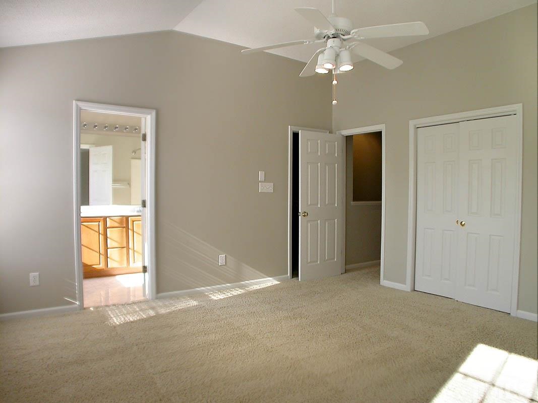 7347 Doverton Court Raleigh, NC 27615 - Photo 11 of 20 a view of an empty room with a window