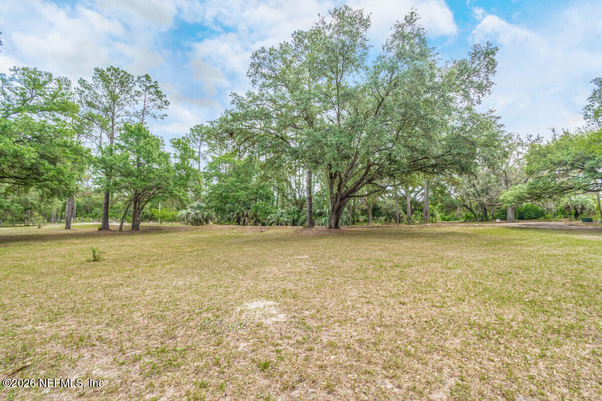 6793 Sandsdale Road Macclenny, FL 32063 - Photo 32 of 37 a view of a field with trees