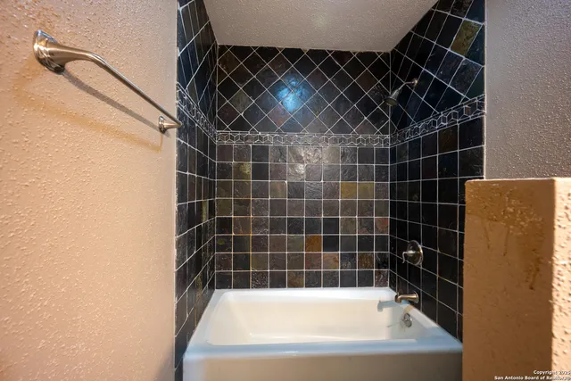 a bathroom with a bathtub
