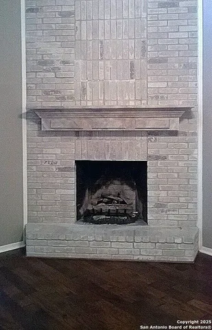 a living room with a fireplace