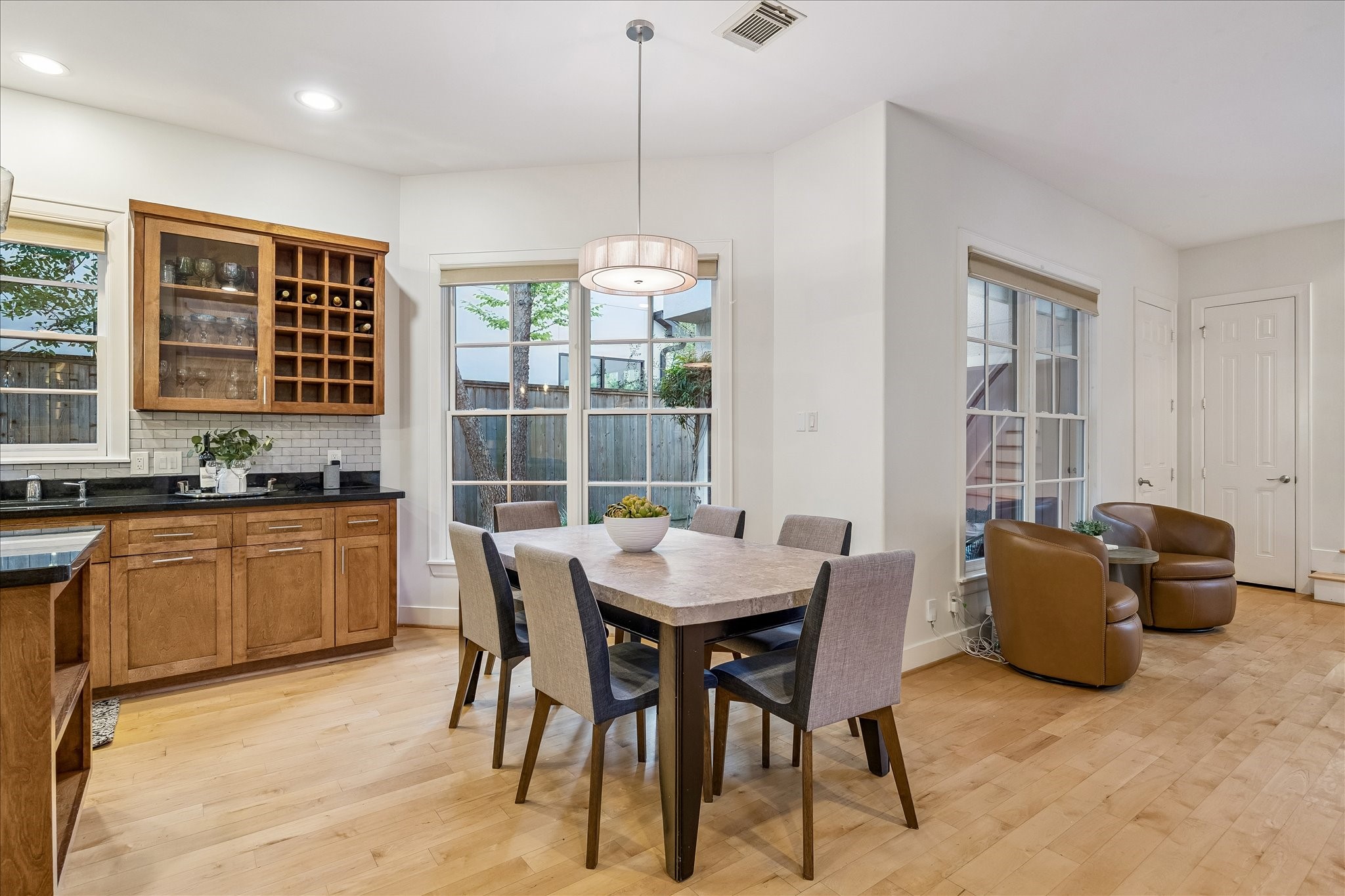 4010 Milton Street Houston, TX 77005 - Photo 10 of 49 BREAKFAST AREA. Because there is no "butler area" between the kitchen and dining, this means that this space was built into the breakfast area instead so a large table can be used here instead of the small tables for 4 we see in most homes.