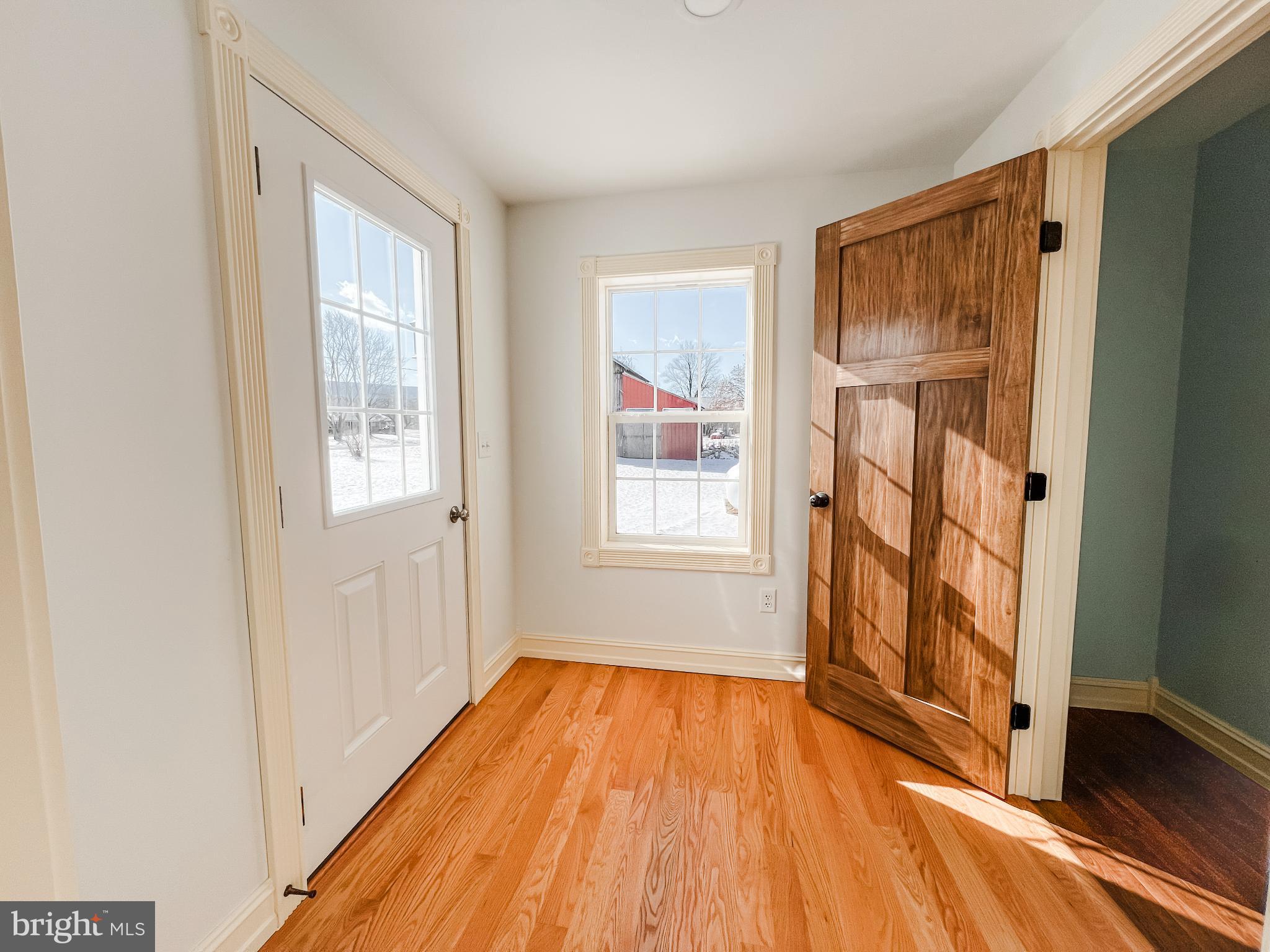 126 South Orange Street Beavertown, PA 17813 - Photo 11 of 25 a view of an empty room with wooden floor and a window
