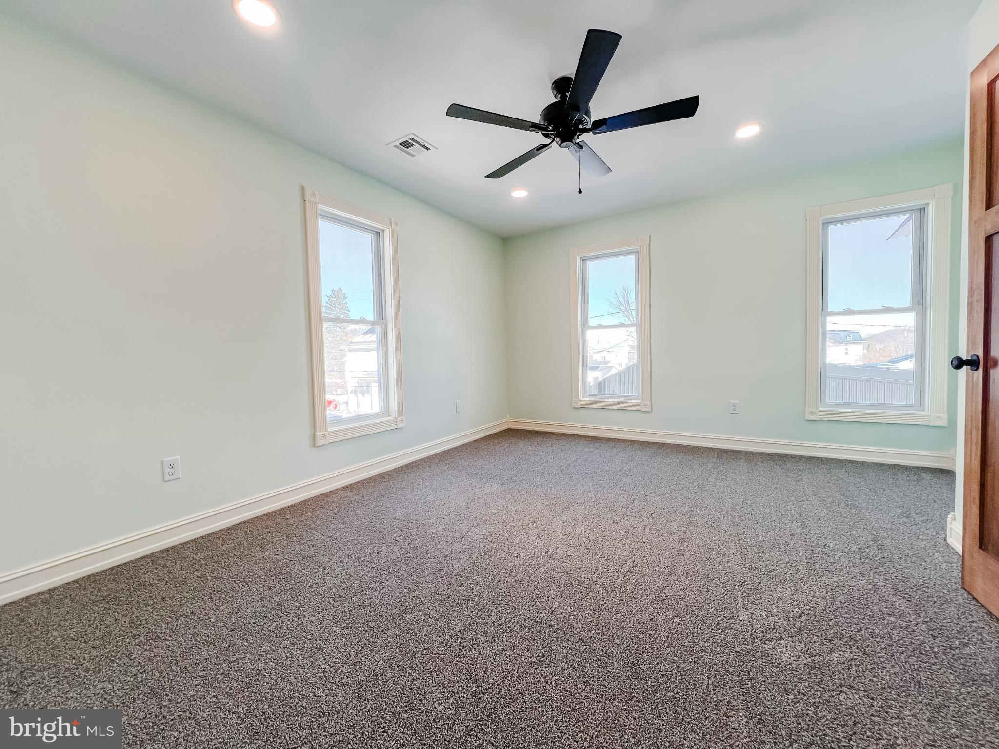 126 South Orange Street Beavertown, PA 17813 - Photo 16 of 25 a view of a livingroom with a ceiling fan and window