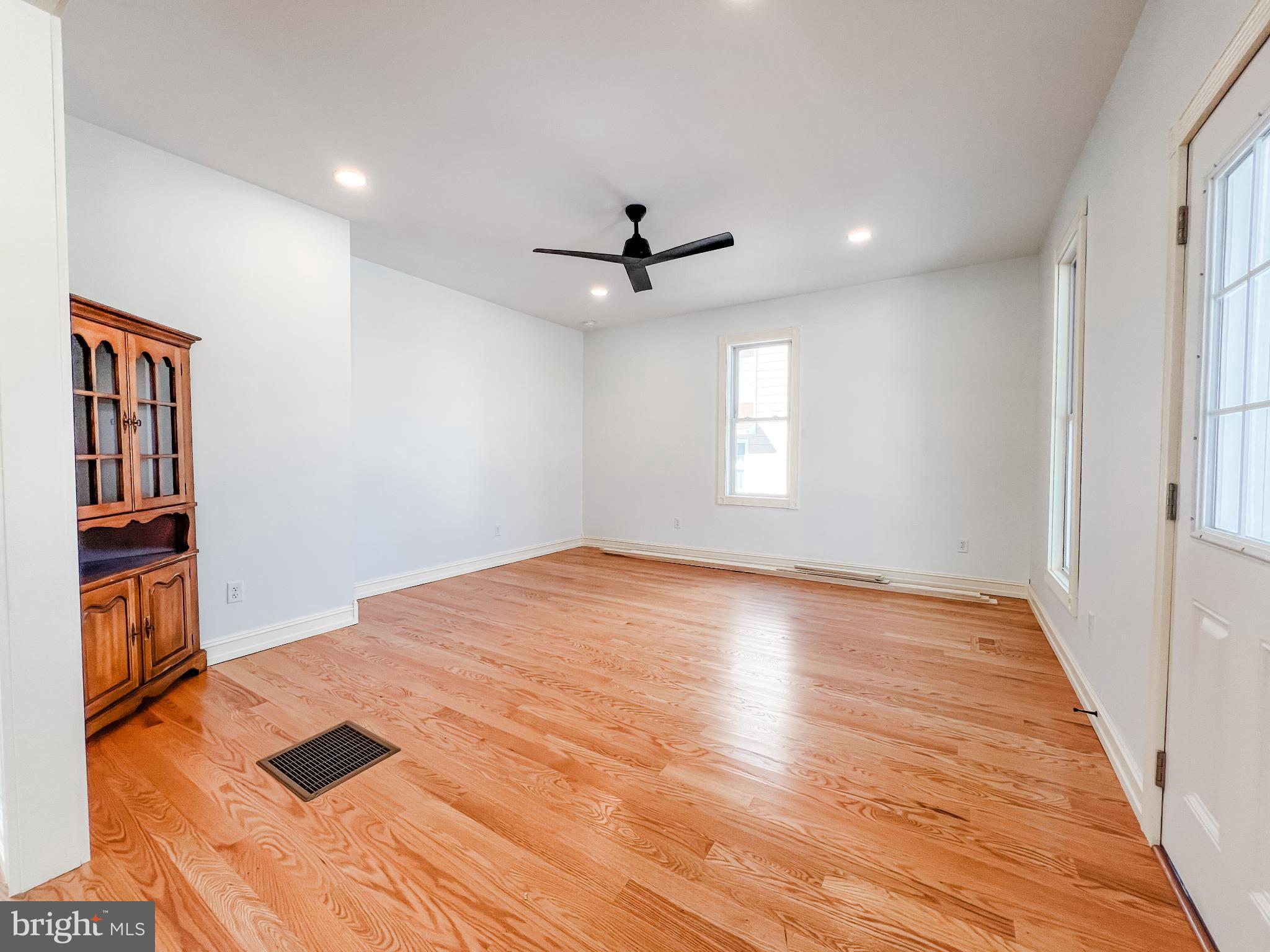 126 South Orange Street Beavertown, PA 17813 - Photo 9 of 25 wooden floor in an empty room with a window