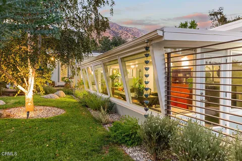 a view of yard with patio