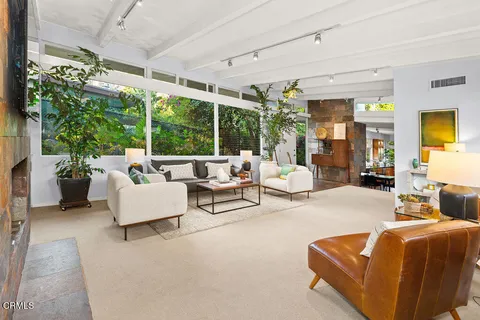 a outdoor living space with furniture and garden view