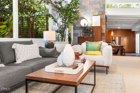 a view of a living room and a yard