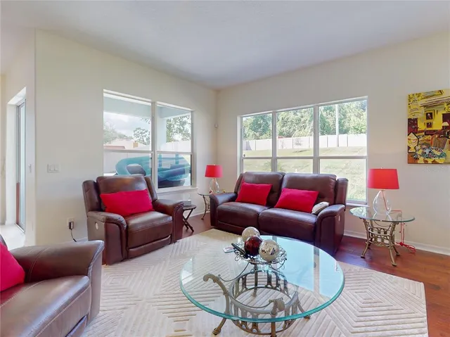 a view of walk in closet with clothes