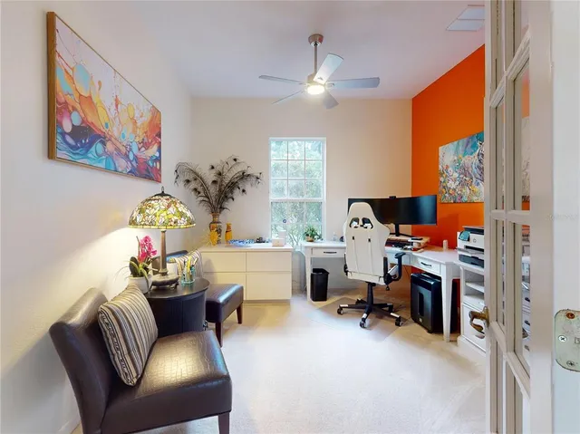 a bathroom with a tub shower vanity and a sink
