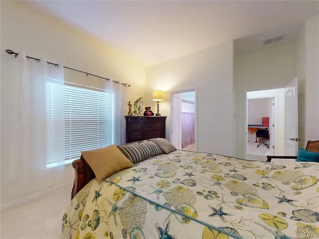 an aerial view of a house with a garden