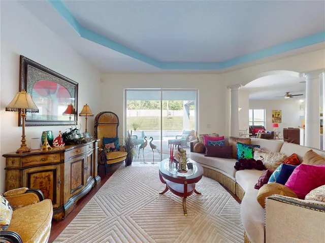 a view of a dining room with furniture window and outside view