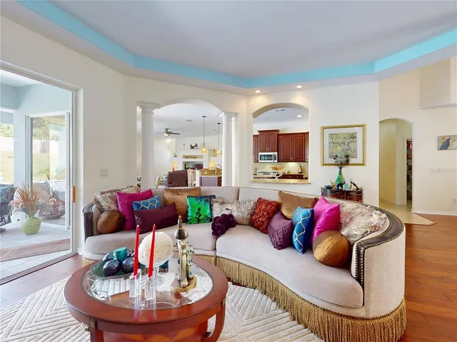 a kitchen with stainless steel appliances granite countertop a sink counter space cabinets and a stove