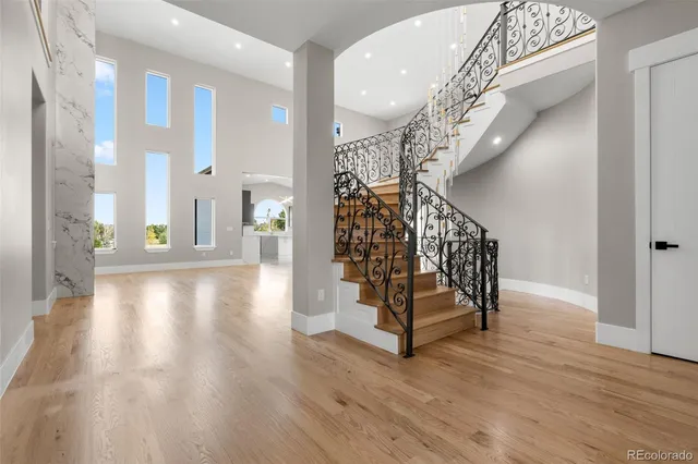 a view of entryway with wooden floor