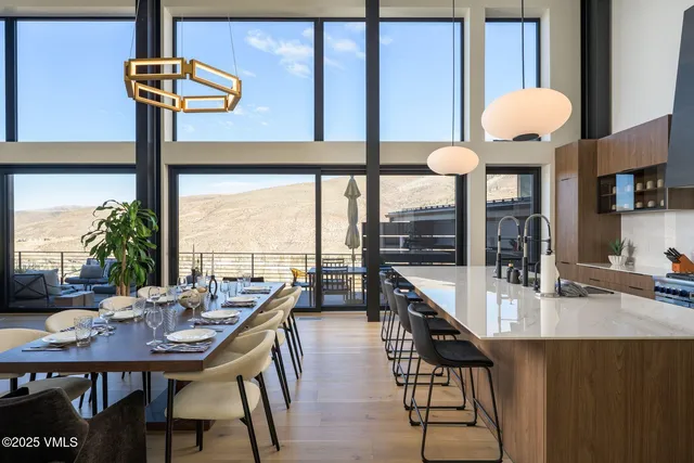 a bathroom with a toilet sink vanity tub and shower