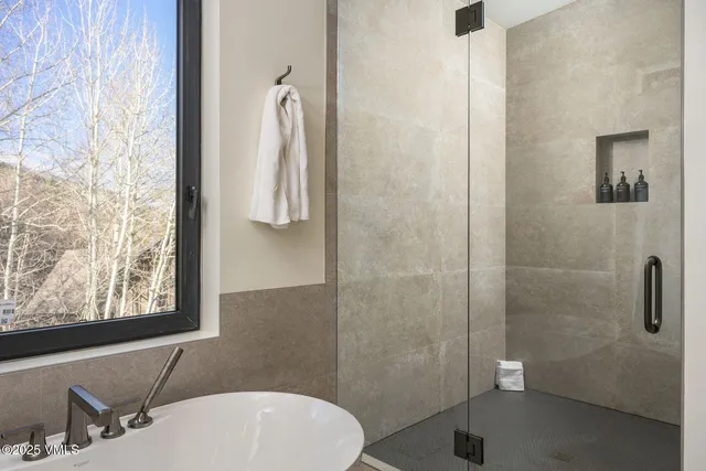 a view of swimming pool with outdoor seating