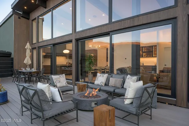 a kitchen with stainless steel appliances a stove a sink and a refrigerator